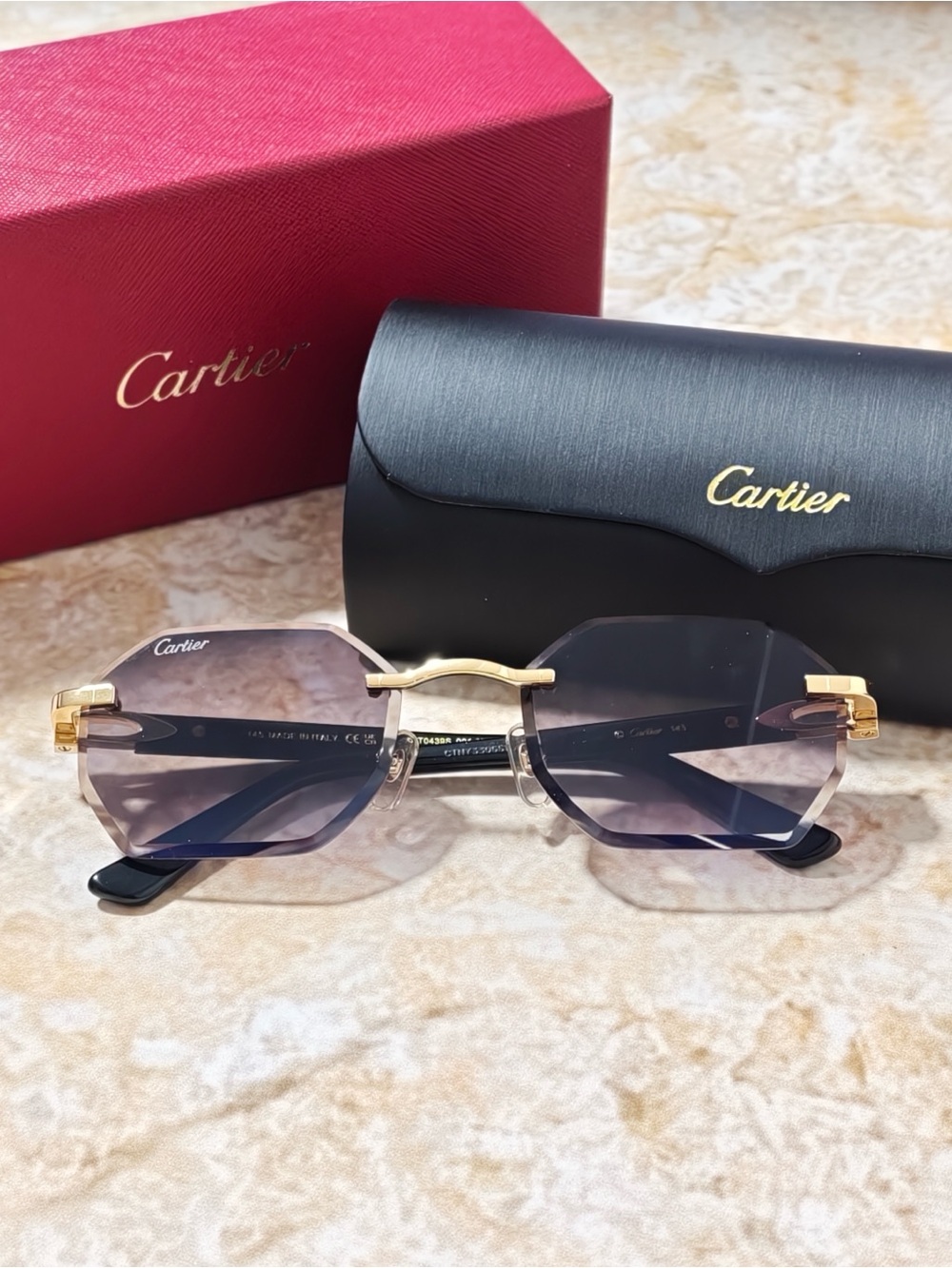 Cartier Women’s Rimless Sunglasses with Purple Gradient Lenses and Gold Accents